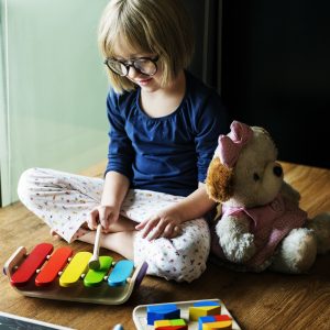 Kid Playing Xylophone Toy Enjoy Concept